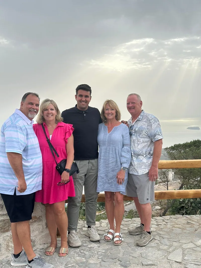 Guests of VH Transfer photographed at a Santorini caldera viewpoint
