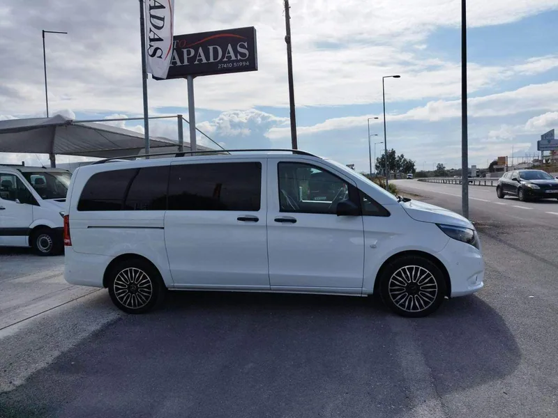 Side view of the white Mercedes-Benz Vito used for Santorini transfers